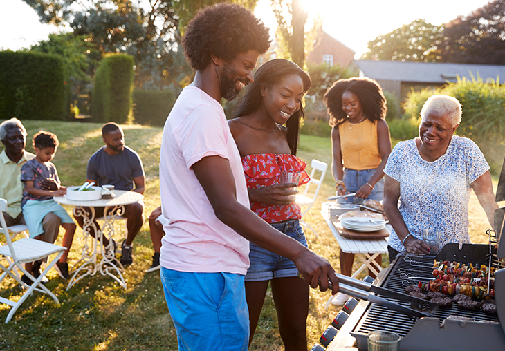 family grilling with propane gas grill serviced by Francis Oil in central virginia